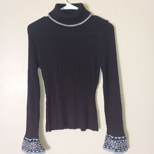 Striking Black Turtleneck Sweater with Patterned Cuffs and Lined Neckline